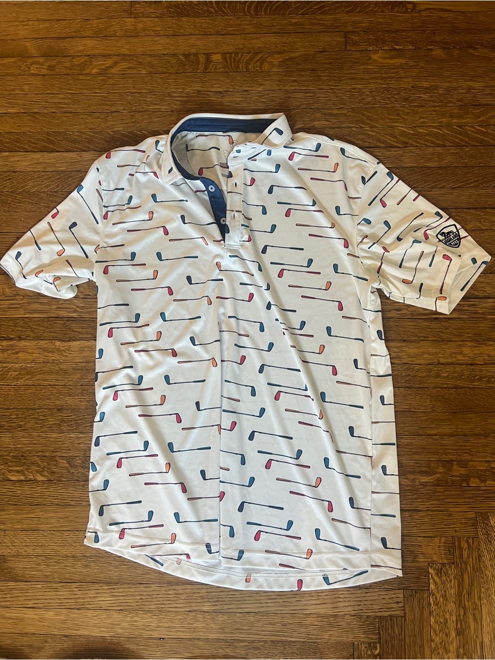 White Golf Polo with Multi-Color Club Print